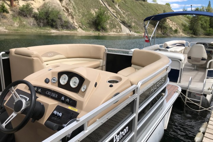 a boat sitting on top of a car